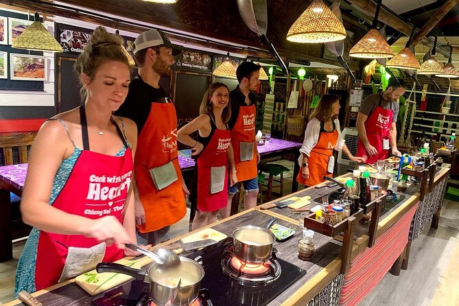 6-Hour Akha Tribe Culture and Cooking Class in Chiang Mai - The outdoor kitchen and Akha setting