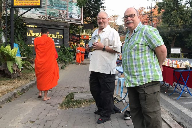 Alms and Wat Phra That Doi Suthep Private Chiang Mai Tour - Walking through Warorot Market