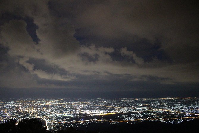 Best seller!! Amazing Night tour, Doi Suthep + Wat umong - Top Must visit! - Climbing the 306-step Naga staircase