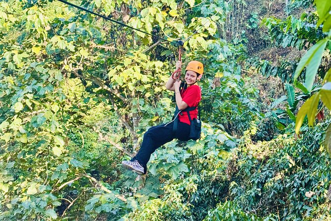 Chiang Mai 3 in 1 Zipline, Elephants and Sticky Waterfall - Meeting rescued elephants with a caretaker