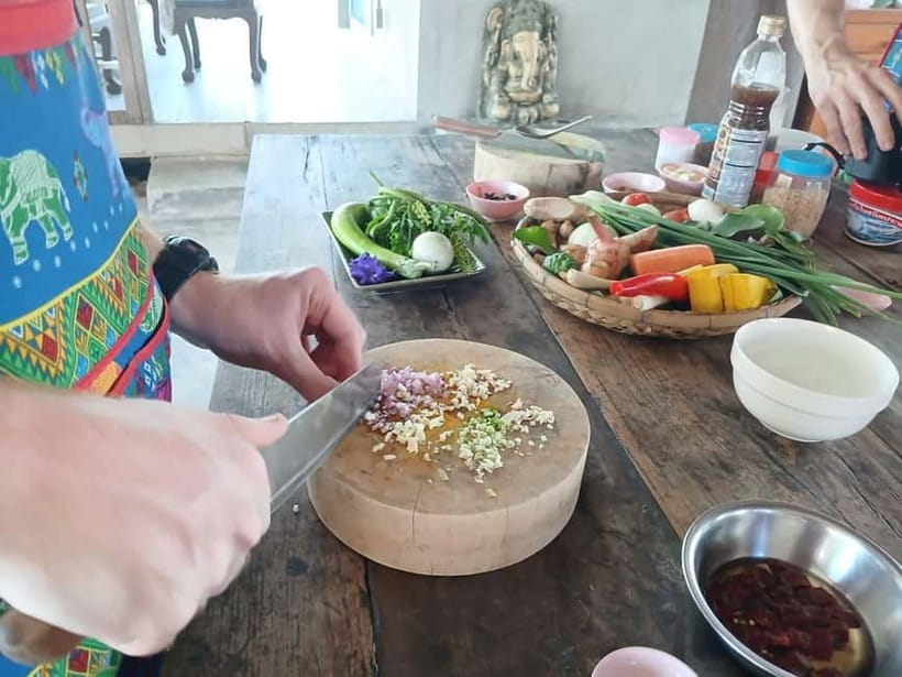 Chiang Mai : Cook in Farm, Market tour & Go by a Local Train - Picking herbs in the organic garden