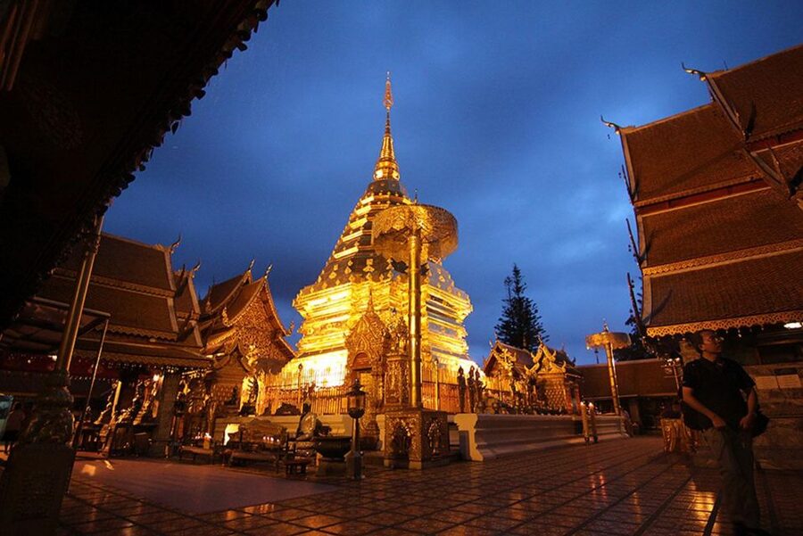 Chiang Mai: Doi Suthep & Wat Umong Twilight Tour with Pickup - The climb to Doi Suthep after sunset