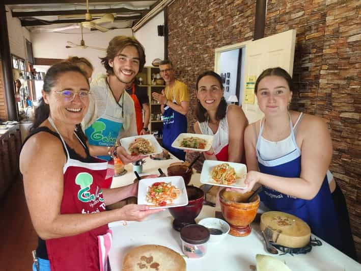 Chiang Mai: Morning Cooking Class with Market Visit - Picking herbs at the organic garden