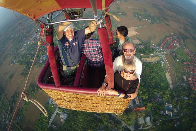 Chiang Mai Sunrise Balloon Flight and Luxury Spa Day - Floating over rice paddies after sunrise
