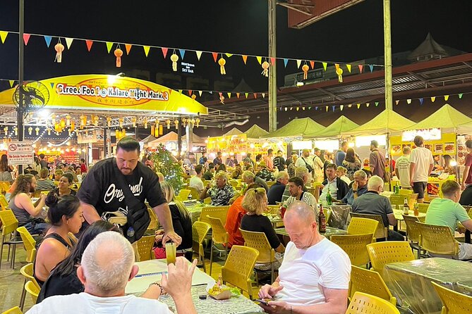Chiang Mai Temples and Market Tuk-Tuk Evening Night Tour - The Night Bazaar is more than a dinner stop