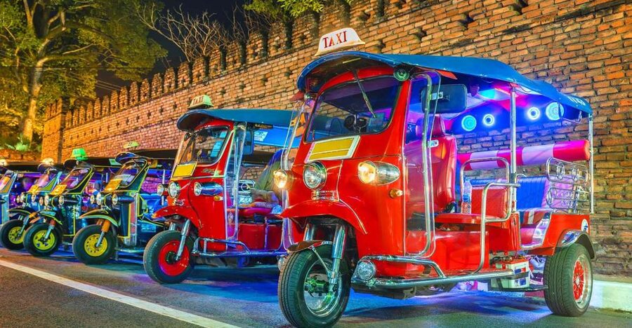 Chiang Mai: Temples and Street Food Night Tour by Tuk Tuk - Hotel pickup and the classic tuk tuk ride