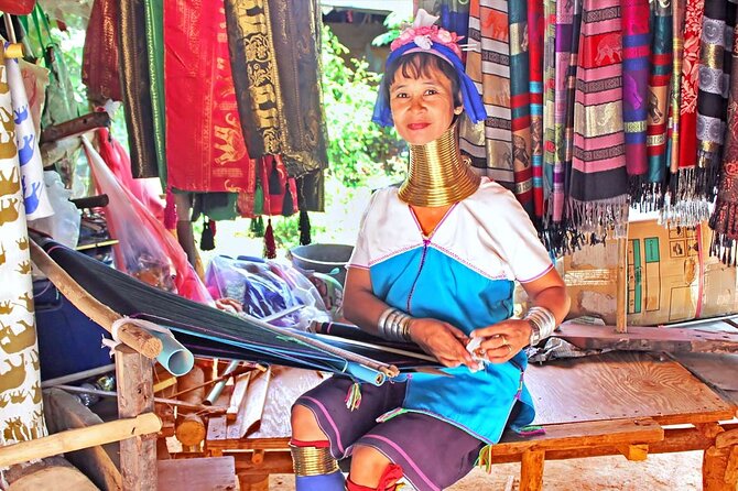 Chiang Rai Full Day Tour with Boat Trip and Longneck Village - Wat Rong Seur Ten brings color and energy