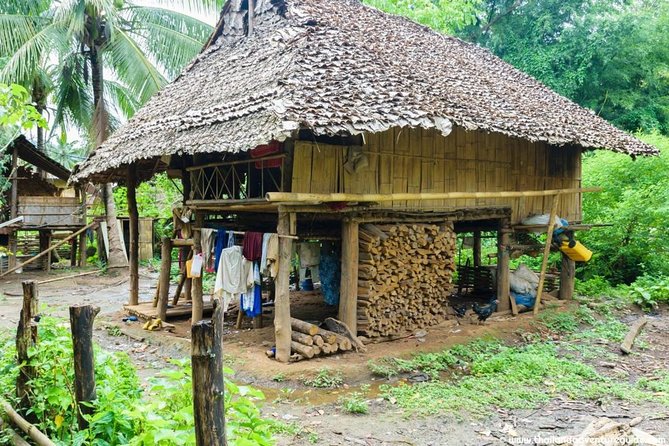 Chiang Rai One Day : White Temple, Golden Triangle, Boat Ride to Laos, Long Neck - The Laos boat ride adds motion and a border view