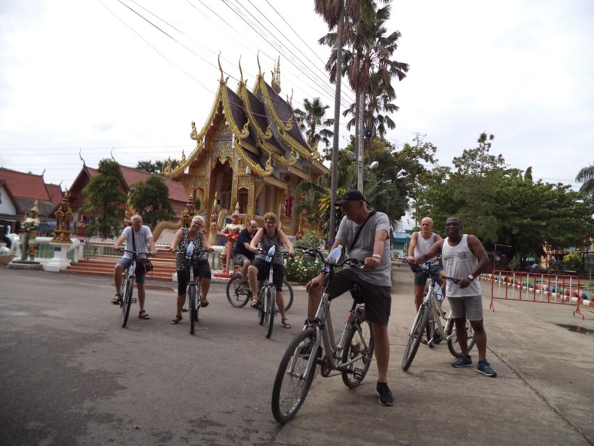 Colors of Chiang Mai Guided Bicycle Tour - Rice fields, orchards, and a market snack