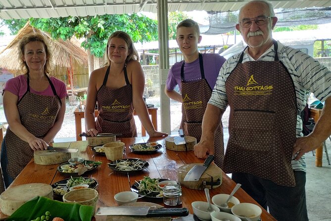 Cooking class in organic garden and local market tour ThaiCottage - Making curry paste by hand