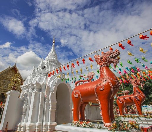 Lamphun and Lampang City Temples Small Group Tour – Full Day - Wat Phra That Hariphunchai beside the river