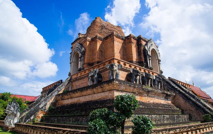 Lanna Heritage Walking Tour: A Journey Through History - Wat Chiang Man and the city moat