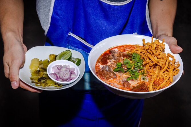 Lanna Kingdom Chiang Mai Food Tour with 15+ Tastings - Riding a red songthaew between local stops
