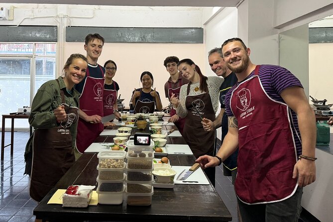 Lanna Smile Thai Cooking Class in Chiang Mai with Market tour - Cooking at your own station in an air-conditioned studio