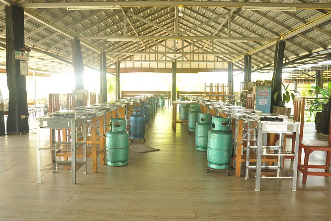 Morning Cooking Class in Organic Farm with Local Market Tour - Cooking your own Thai meal