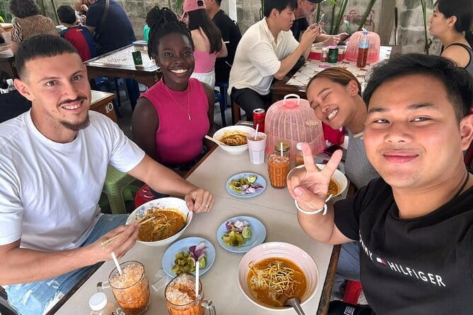 Old Town Chiang Mai Food Tour with 10+ Local Dishes Tastings - Wat Inthakhin Sadue Muang and a smaller temple stop
